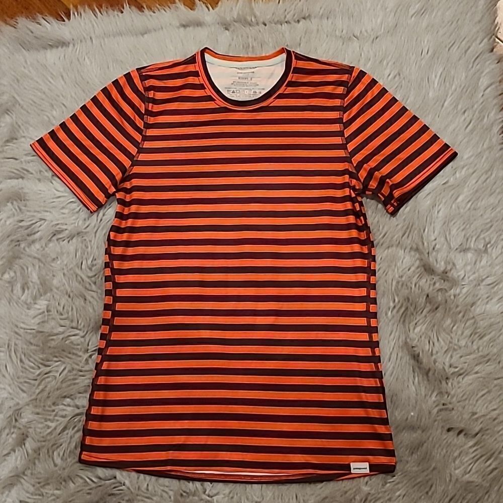 Patagonia womens bright orange and brown stripped polyester and spandex tshirt